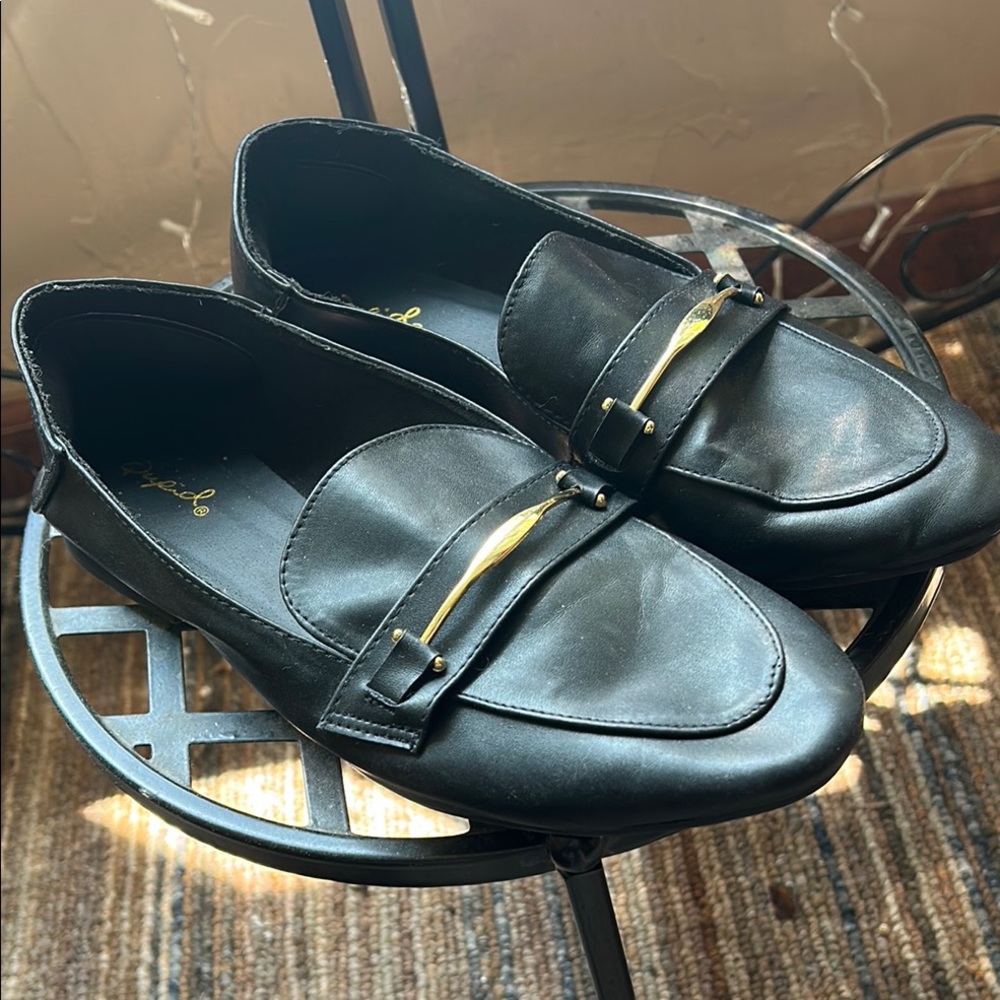 Black Loafers with Gold Accent
